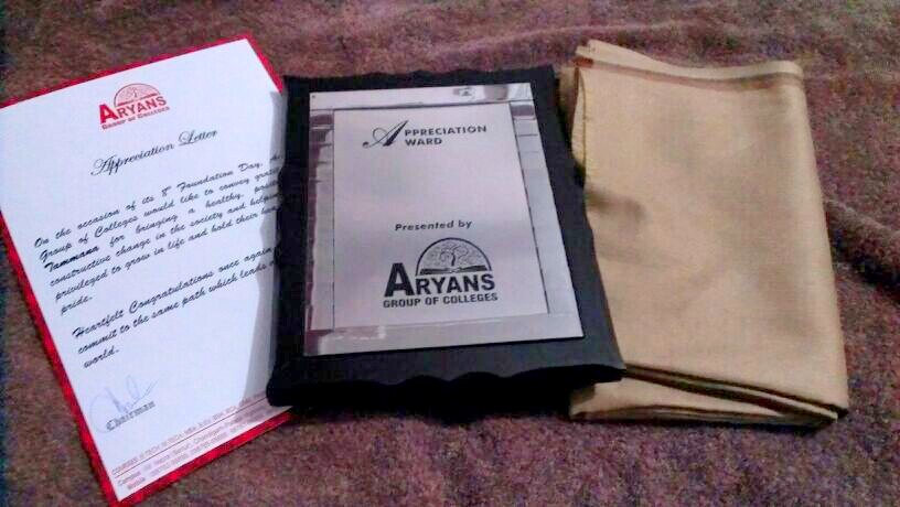 Honoured by 'Aryans College'